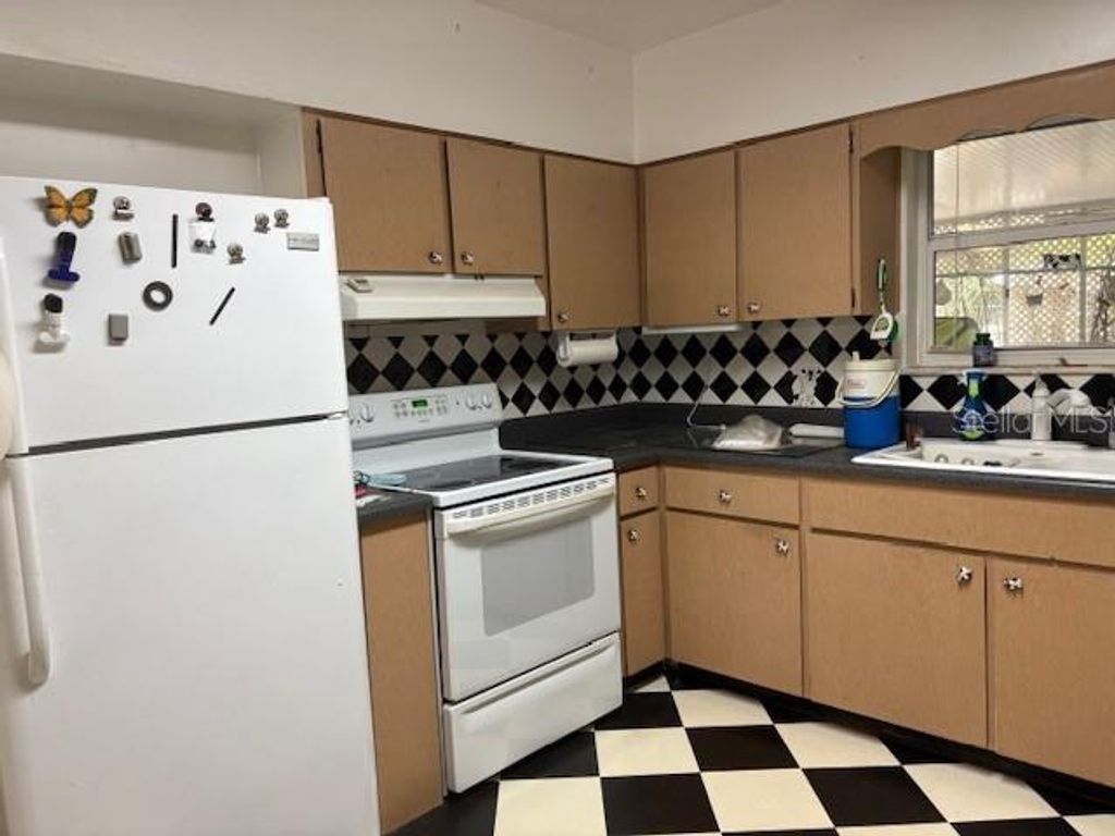 Photo of 6121 Whiteway Drive, Temple Terrace, FL 33617 (MLS # TB8461175)