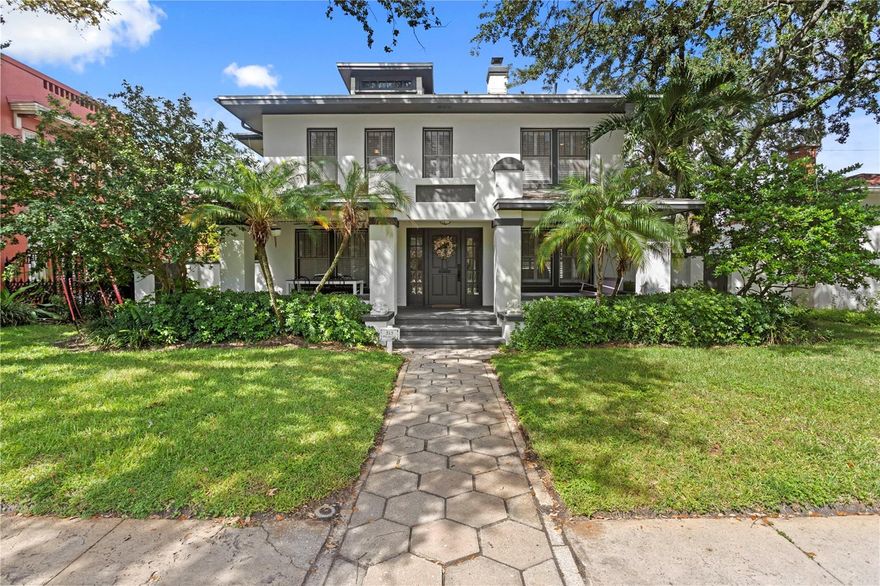 YOUR DREAM HOME IN OLD NE AWAITS STEPS TO COFFEE POT BLVD.  Discover the perfect blend of charm, functionality, and prime location in this stunning stately home nestled in the heart of Old Northeast. Solid BLOCK construction and high elevation give you assurance this home is capable to withstand 100+ more years! Recent storms have posed no threat to this beauty, offering peace of mind as you settle into your new home. From the moment you arrive, this residence captivates your senses. The classic front porch, complete with a charming swing, invites you to relax and enjoy the gentle Bay Breeze while sipping your morning coffee or unwinding with an evening cocktail. Upon stepping inside, you'll immediately notice the meticulous attention to detail, from the original hardwood flooring to the cozy wood-burning fireplace—this home truly embodies timeless elegance. The spacious layout is perfectly designed for both entertaining and tranquil living. The bright front living room seamlessly transitions into an airy reading nook that can serve as a cozy den or home office, drenched in natural light. The formal dining area, framed by elegant French doors, leads to a beautifully curated backyard and pool space, creating the ideal setting for gatherings with friends and family. The expansive family room, conveniently located near a half bathroom, offers easy access to both the kitchen and outdoor sanctuary. Your culinary dreams will come true in the generous kitchen, featuring ample counter space and custom cabinetry that will delight any chef. The recently renovated estate- sized pool and private backyard retreat are perfect for outdoor entertaining or enjoying a refreshing dip on a sunny day. The detached two-car garage includes a beautifully remodeled loft, complete with a wet bar and full bathroom ideal space for guests, an office, or a fun game room! This bonus space with modifications can easily be a legal apartment for extra income. Upstairs, in the main home, you’ll find 3 bedrooms one with a second living space and en-suite half bath that could make for a playroom or double shared bedrooms making 4 bedrooms upstairs. For the age of the home you will be impressed with the closet space. There are two additional full bathrooms upstairs one of which is the private en-suite off the primary bedroom. Primary retreat, showcasing a spacious bathroom with soaking tub, separate shower, and WC. Significant mechanical upgrades, including a new roof, all-new plumbing, an upgraded HVAC system, and a new hot water heater, ensuring a worry-free living experience. Location is key! Enjoy a leisurely stroll to the picturesque Coffee Pot Bayou, or take a short walk to vibrant Downtown St. Petersburg, where shopping, dining, and cultural experiences await. With easy access to two international airports and the beautiful Gulf beaches, the opportunities for adventure are endless. Want to spend a day at the Pier? Just hop in your golf cart! Spanning over 3,000 square feet, this magnificent home offers the ideal balance of classic architecture and modern luxury, featuring 4 bedrooms, 3 full bathrooms, and 2 half bathrooms in total. The versatile loft above the garage is zoned as a legal apartment. Don’t miss your chance to own this exquisite Old Northeast home—where sophistication meets the vibrant lifestyle of Downtown St. Petersburg! Schedule your private tour today!