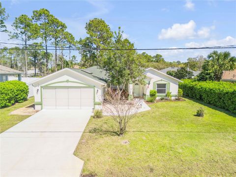 Photo of 23 Poplar Drive, Palm Coast, FL 32164 (MLS # O6345535) Photo of 23 Poplar Drive, Palm Coast, FL 32164 (MLS # O6345535)