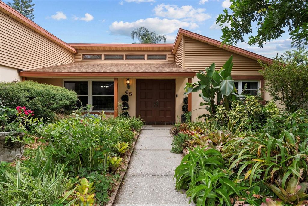 Photo of 65 Harbor Woods Circle, Safety Harbor, FL 34695 (MLS # TB8420422)