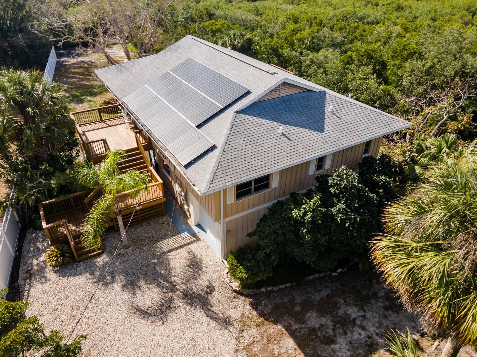 1980's Florida Home nestled on a private and secluded property at 5060 Lemon Bay Drive. This charming house is now available for sale and offers a fantastic opportunity for those seeking a tranquil retreat. As you step inside, you'll be greeted by an open concept floor plan that allows for seamless flow throughout the home. The stainless-steel appliances in the kitchen add a modern touch, while the abundance of windows ensures plenty of natural light floods in, creating a warm and inviting atmosphere. The massive great room is perfect for entertaining guests or simply enjoying quality time with loved ones. You'll also find wrap-around decks and a screened porch where you can relax and soak up the serene surroundings. The primary bedroom boasts an en-suite bathroom complete with a large walk-in tile shower and a spacious walk-in closet. With direct access to the screen deck, you can easily step outside and enjoy your morning coffee amidst nature's beauty. Featuring 16" ceilings and hardwood flooring in the main/common rooms, this home exudes charm and character. Situated on over 1 acre of land with a creek, you'll have the luxury of a dock for launching kayaks, canoes, and paddle boards. For added convenience, a small annual fee to the South Venice Civic Association grants access to amenities such as the Venice Beach Ferry and a boat launch. Plus, you'll be just minutes away from Legacy Trail, perfect for outdoor enthusiasts.
Very easy to show.