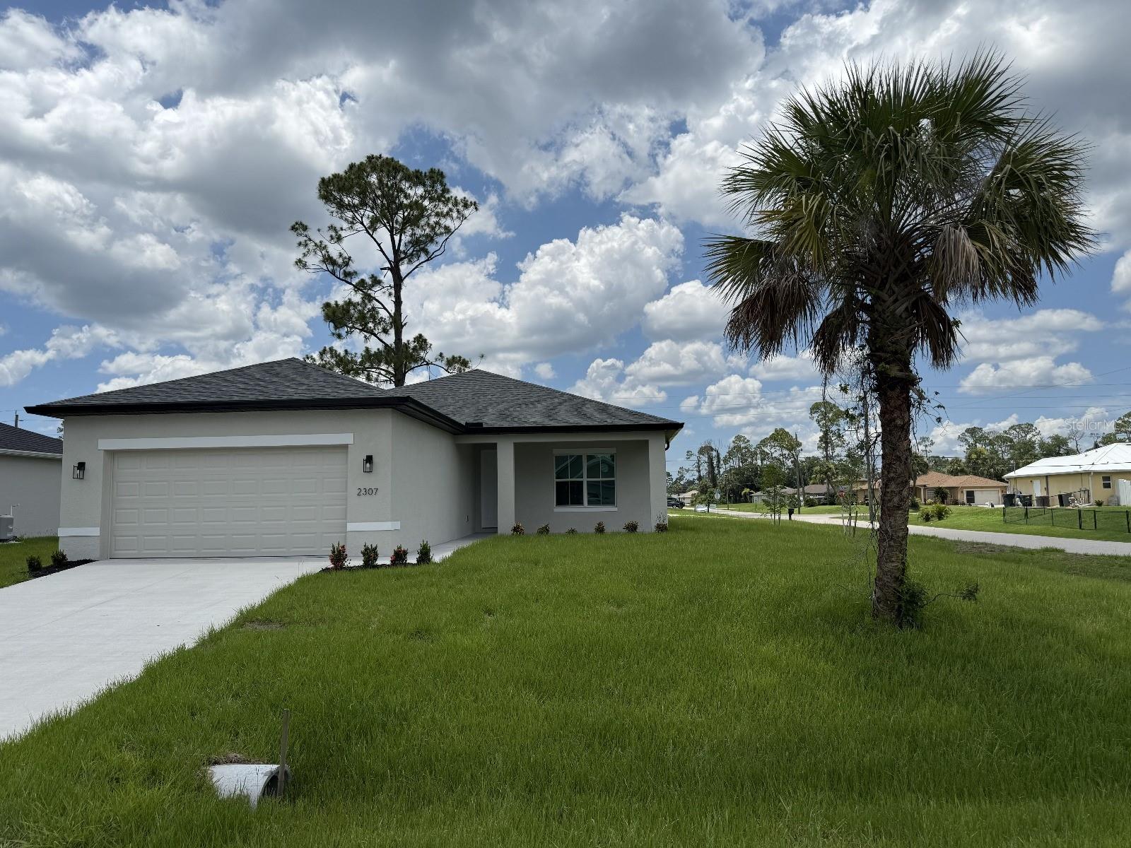 Available immediately for annual rent in North Port, this brand-new corner lot home built in 2025 has never been lived in. It features three bedrooms , two bathrooms and nearly 1,650 square feet of living space. The open-concept design includes a spacious kitchen with island, perfect for entertaining. Situated on a 11,000-square-foot lot, the property offers ample outdoor space while being conveniently located near I-75. Additional features include a laundry closet, and a two-car attached garage. Credit and background checks are required. Pets are considered on a case-by-case basis.