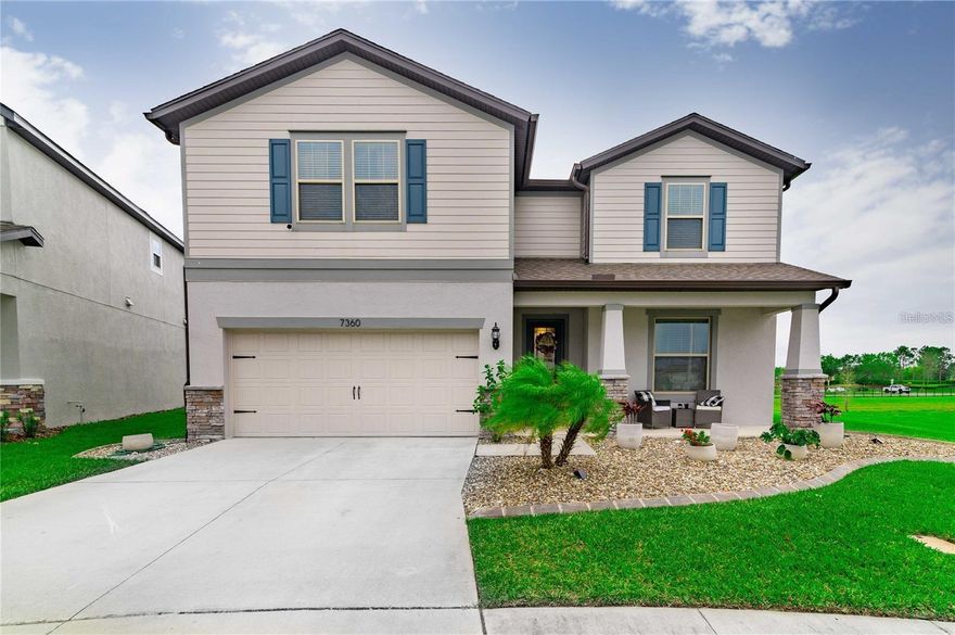 Welcome to this stunning 5 bedroom, 3 bath, 2 car garage with a huge BONUS room. The home in the desirable gated community of Epperson Ranch community featuring the FIRST NATIONAL CRYSTAL LAGOON! Citrus Grove model & CUSTOM DESIGNED, At the heart of the home is the beautiful kitchen with gleaming quartz countertops, ample storage space including a pantry, sleek tile backsplash, and all stainless steel appliances. The large working island extends out to a counter-height breakfast bar and overlooks the spacious family room and the dining area, so you never have to miss out on a thing! The spacious first-floor master suite includes a dual-sink vanity, walk-in closet, and a large walk-in shower. The 2nd bedroom and bath are on the first floor as well which is perfect for your guest or your home office. Upstairs you will find the 3 additional bedrooms with walk-in closets and a massive bonus room, which makes for the perfect game room, play area, exercise room, home theater, or anything you want! The large backyard is great to play or have a relaxing evening on your back lanai with your beautiful pond view. The lagoon features sandy beaches, cabanas, waterslides, and water toy rentals. Epperson is an ultrafine community, offering the fastest internet speeds run over an all-fiber network. Cable and internet are included in your HOA fee. Epperson is a golf cart-friendly community with trails and tunnels throughout the neighborhood. Additional parks, playgrounds, dog parks,s and green spaces located throughout the community make this the perfect place to live and play! The community is in the heart of Wesley Chapel, close to the best shopping and dining options, and convenient access to highways for a quick commute to downtown, or the Tampa Airport. Come take a look and see all this community.