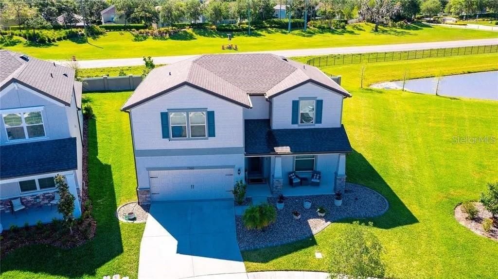 Photo of 7360 Pool Compass Loop, Wesley Chapel, FL 33545 (MLS # TB8439365)
