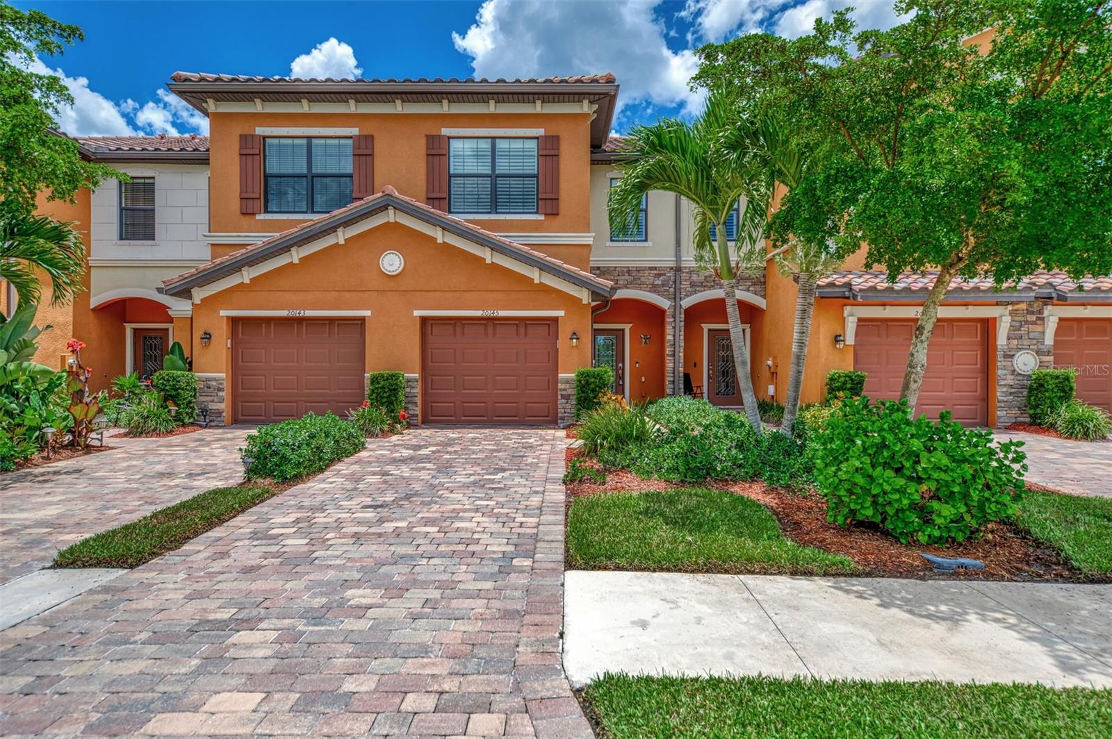 SPECIAL PRICING OF $2,200 EACH MONTH IF YOU BOOK FOR AT LEAST 3 MONTHS BETWEEN JULY 2025 - DECEMBER 2025 --- GRAN PARADISO --- TURNKEY FURNISHED 3 BEDROOM, 2.5 BATH, 1 CAR GARAGE TOWNHOME --- High Season (December-April): $6,500/month (utilities included; electric capped at $100/month) --- Low Season (May- November): $2,750/month + Guest reimburses for utilities. This turnkey 3-bedroom, 2.5-bath townhome in the gated community of Gran Paradiso offers luxurious living with modern amenities and tasteful upgrades. Meticulously maintained and fully furnished down to essentials like plates and silverware, this home features an open layout with tile flooring, crown molding, decorative trim, and plantation shutters. The kitchen boasts rare white cabinetry, granite counters, a tile backsplash, and a water filtration system. Hurricane shutters provide safety, and the 1-car garage adds convenience. Enjoy warm natural light with southern exposure and serene water views from the screened lanai. Close to dining and shopping, 1.5 miles from Costco, 1 mile from Publix, and 8 miles from the beach, this home ensures prime access to amenities. Gran Paradiso offers resort-style facilities, including a pool, tennis, pickleball, and more. Durations 6 months or less require 13% additional tax and all funds paid up front. Durations longer than 6 months require first, last, security deposit & credit application fee. Membership transfer required. Pet friendly upon owner approval and $500 non-refundable pet fee. (Sorry, No Cats Allowed!) --- MINIMUM OF 3 MONTHS RESERVATION.