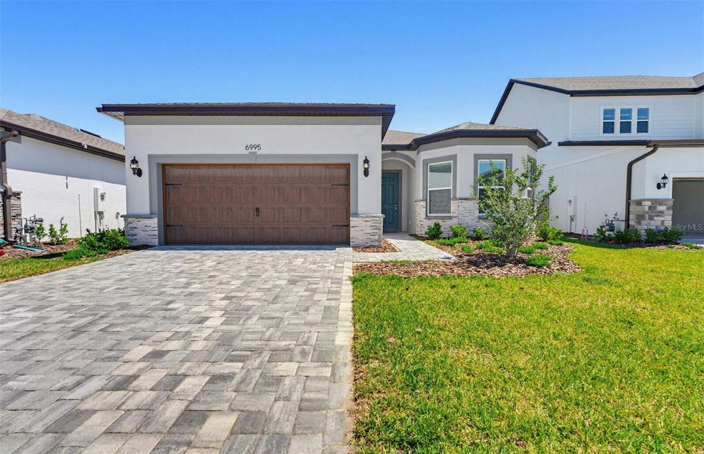 Photo of 6995 Depue Drive, Wesley Chapel, FL 33545 (MLS # TB8469604)