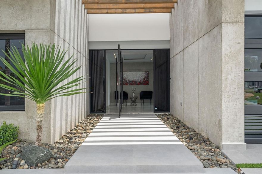 This recently remodeled single-home property is a true masterpiece, offering a harmonious blend of opulence and resort-style living. Featuring 4 bedrooms, 4 bathrooms, 4,800 sqft of construction, with a spacious living area of approximately 3,000 sqft, the home sits in one of the largest lots in Dorado del Mar, tucked away on a private Cul de Sac street. It comes fully furnished and equipped with literally everything you possibly need to either make it your home or set it up as a short-term rental investment. 

The timeless design of the façade ensures that the property remains beautiful day and nigh. As you step inside, you'll be greeted by a custom-made pivot door and recessed ceilings adorned with spotlights. A sound system has been thoughtfully installed throughout the entire property, even extending to the bathrooms. From high ceilings, custom flooring and textured walls to the elegant quartz countertops, every aspect has been thoughtfully designed.

The master suite is huge and includes a small living space with a sitting area and TV, and access to the outdoor terrace. The bathroom is equally impressive, boasting double showers, a luxurious bathtub, and his and hers vanity space. The walk-in closet is sure to amaze with its spaciousness and beautiful lighting, providing ample space for all your wardrobe needs, including space for more than 120 pairs of shoes! The additional 3 bedrooms—including the junior suite—are also equipped with TV’s and sound system and beautifully decorated. 

Step outside, and you'll find an expansive patio space, terrace, pool and outdoor kitchen. The innovative pool is surrounded by artificial grass atop cement, offering a refreshing oasis. Poolside entertainment is taken to the next level with an exterior 86" flat TV, connected to the outside sound system. For added convenience, there's a full outside bathroom with storage space and a fire pit near the pool, making it an ideal spot to enjoy clear skies and warm evenings.

No expense has been spared in curating every detail of this home to exude modern sophistication. Additional features include high-efficiency air conditioning that are independently installed, double garage with an additional golf cart garage; cava for wine tastings; installed security cameras; a full power generator with a 20k caterpillar and transfer switch; utilities are set up for solar system upgrade in the future; water cistern; top of the line kitchen appliances, and a smart system that allows you to control most things through your smartphone. The landscaping has automatic water irrigation system and spotlights, enhancing the overall curb appeal

Living in Dorado del Mar grants access to Embassy Suites Resort amenities, offering an exciting range of activities for every interest, from pickleball courts, billiards halls, bowling alley, to a golf range, casino and 3 new restaurants. The promise of even more amenities coming soon ensures that there's always something new to discover and enjoy.