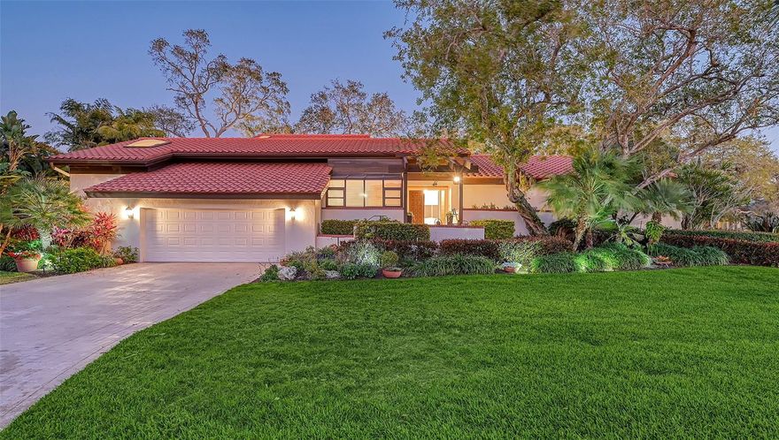 Welcome to your luxurious retreat on Longboat Key, tucked away behind the gates of Bay Isles and the Longboat Key Club. This custom, freshly renovated 3396 square-foot home boasts exquisite details and top-of-the-line finishes throughout. Enter the heart of the home to find a gourmet kitchen fit for a magazine cover, equipped with state-of-the-art Viking appliances custom cabinetry and Italian white oak wide plank floors that flow seamlessly into the living space. Entertain with ease at the custom bar featuring a beverage cooler, ice machine, and beer tap, while the adjacent flex space beckons with a pool table, large screen TV, dartboard, and a designer Murphy bed for added convenience. Retreat to the master suite, privately nestled away from the other bedrooms, complete with an office space, custom closet featuring designer storage solutions, and a spa-like bathroom that will leave you breathless. Additional features include a convenient pool bathroom with designer glass tile and coastal finishes, two guest bedrooms privately situated upstairs with their own media room, and a tropical oasis awaits outside in the oversized corner lot yard, adorned with lush landscaping that earned the Yard of the Year award in 2019. Relax and unwind by the expansive pool, boasting ample deck space for lounging and entertaining, making every day feel like a vacation in paradise. Don't miss the opportunity to call this stunning property home – schedule your private showing today!