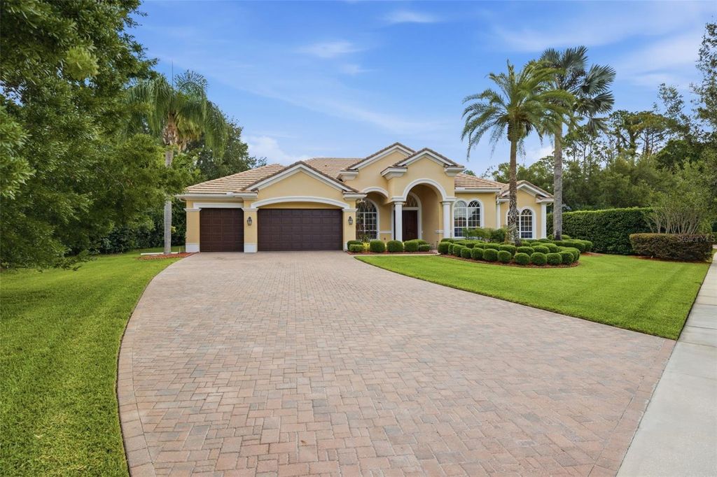 Photo of 9409 Tree Tops Lake Road, Tampa, FL 33626 (MLS # TB8510127)