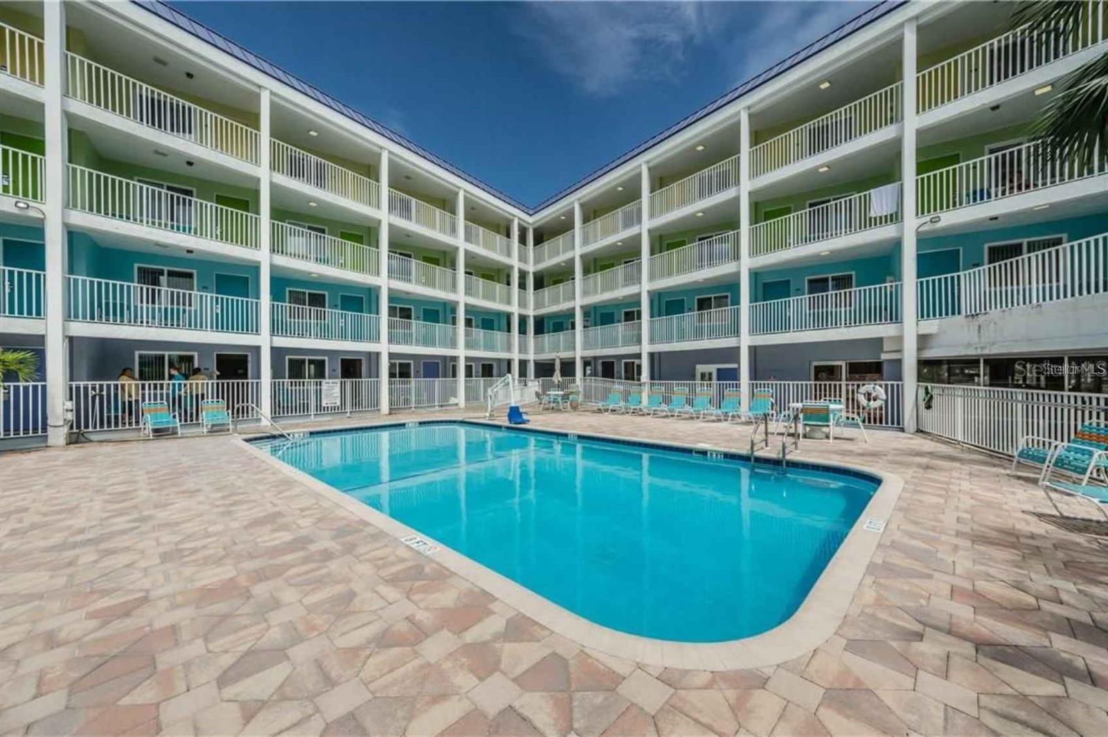 INVESTMENT INCOME OPPURTUNITY with DAILY RETALS in the HEART of top rated vacation destination of CLEARWATER BEACH. Fully Furnished and TURNKEY 3rd floor unit with a partial view of GULF waters. BEACH access directly across the street. Unit offers 384 Square feet with a fully equipped Kitchenet, private Bath and spacious bedroom with 2 beds. On-Site rental office is available or the freedom to use a third party or self manage. Owner use of 28 days with no Blackouts dates. Owners and guests can enjoy the heated POOL. Centrally located and Surrounded by activities for all ages including the Clearwater aquarium, dolphin sunset cruises, the Clearwater Marina, souvenir shops and delicious restaurants! Excellent 1031 exchange with possible Owner Financing.