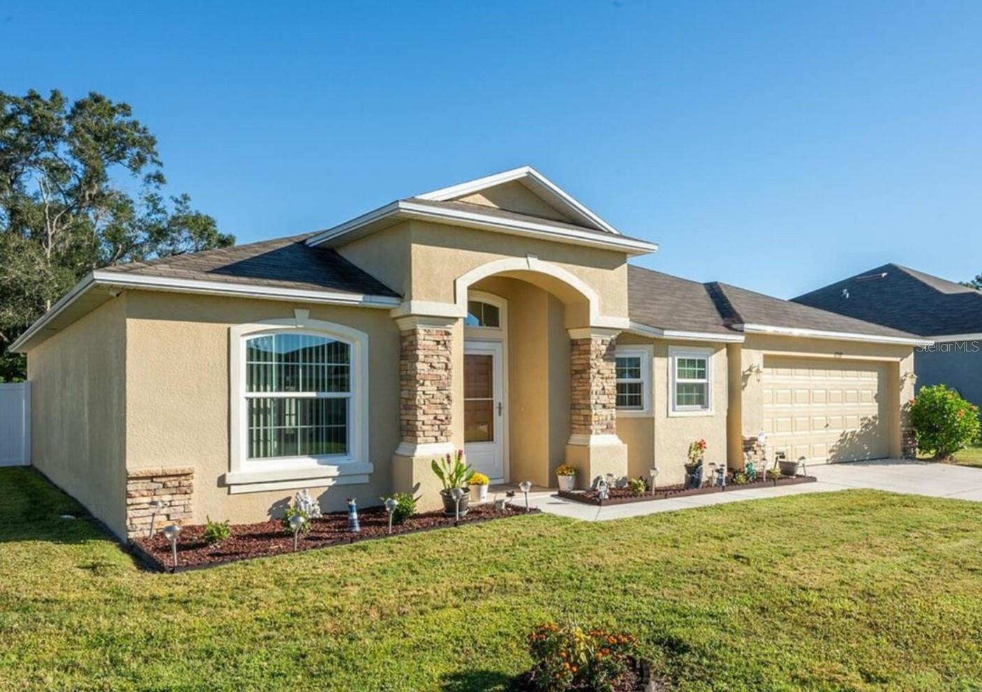 This beautifully maintained home in Lakeland offers more than just great condition—it delivers space, style, and smart functionality. Soaring ceilings and oversized bedrooms provide that extra level of comfort everyone’s looking for. The kitchen? Wide, functional, and fully equipped—including a fridge that perfectly fits the flow, with a practical top-fridge/bottom-freezer design that’s easy to use (check the photo!). Cabinetry stands tall at 43 inches, offering elegance and extra storage. And just to give you a better idea of the space—check the bedroom photo: it fits a king bed plus two cribs and still feels spacious. That’s the kind of layout that’s hard to find! The entire home is finished with sleek ceramic tile—no carpet anywhere, not even on the baseboards. Step outside to a giant fully fenced backyard with a shed for extra storage, plus a spacious covered and screened lanai—ideal for relaxing or entertaining. All of this in a highly versatile location with easy access to everything Lakeland offers. Owner is open to lease with option to purchase—contact listing agent for full terms.