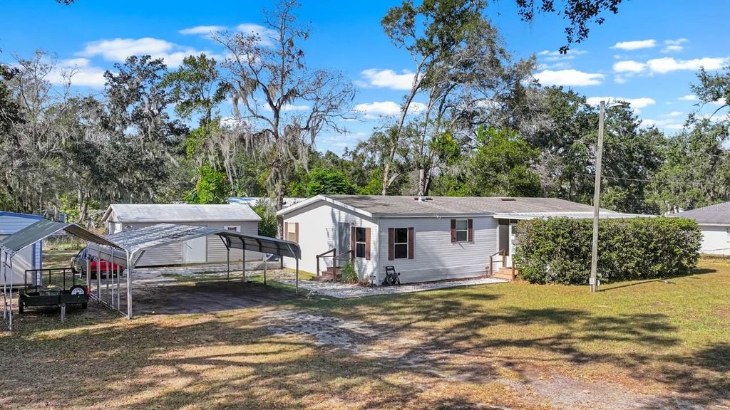 Photo of 11622 Grovewood Avenue, Thonotosassa, FL 33592 (MLS # TB8454694)