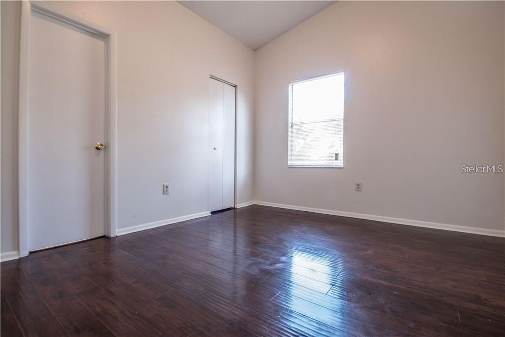 Photo of 1003 Winterberry Lane, Orlando, FL 32811 (MLS # O6405637)
