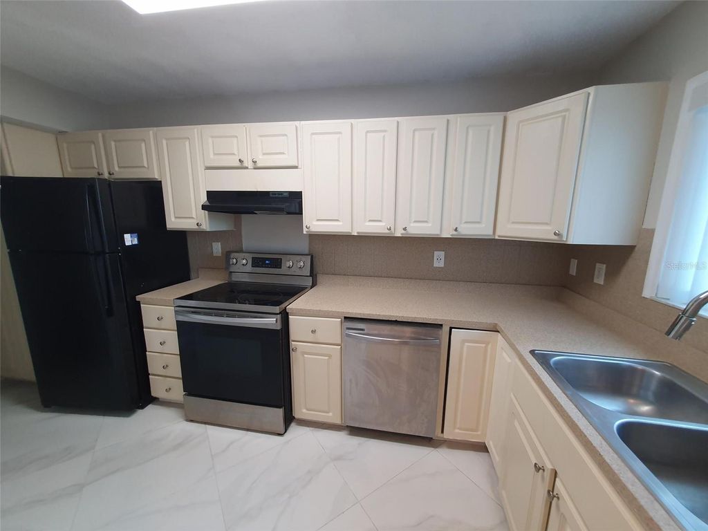 Photo of 1927 Orange Boulevard Way, Palm Harbor, FL 34683 (MLS # TB8491519)