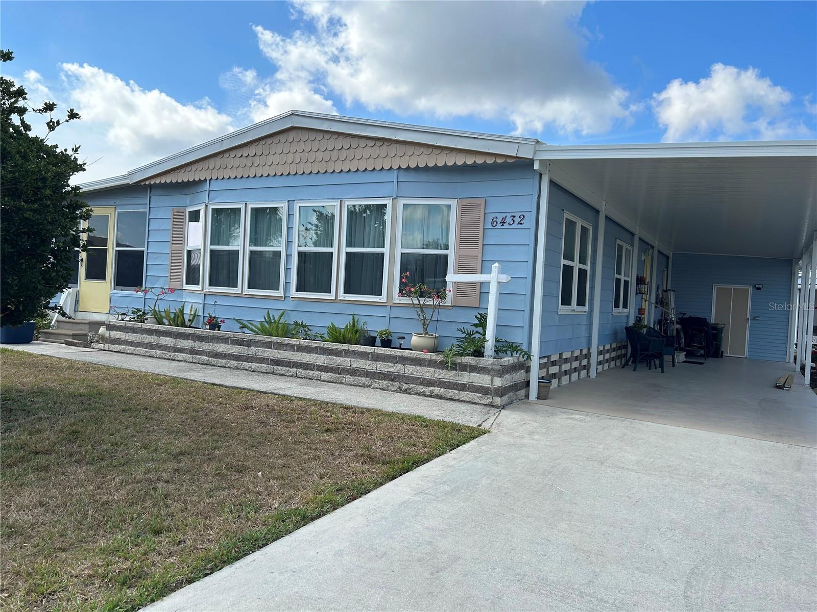 ***OWNER IS MOTIVATED!!*** Experience the best of Florida living in this beautiful move-in ready mobile home located in the sought-after Holiday Park community. This home offers the perfect blend of relaxation and excitement. Bask in the Sunshine State's warm weather and enjoy a multitude of activities right in your own back yard. Situated on a prime corner lot, this fully furnished home is waiting for you to call it your own. What's more, you'll own the land your home sits on, providing you with the ultimate sense of ownership & pride. The 55+ gated community boasts a range of amenities to keep you entertained and active all year round. Take a dip in one of the two heated pools, play a game of tennis or pickleball, work out at the fitness center, or challenge friend to a game of billiards. The clubhouse also offers a library & meeting rooms for social gatherings & events. Convenient to I-75 & US-41/Tamiami Trail, Myakka River, beautiful Venice Beach, world-class fishing, boating, golf courses, top-rated restaurants, shopping, a soon to be built Sarasota Memorial Hospital and so much more. What's more, you'll have the piece of mind knowing the the association maintenance fee of $1,556/year is included in your annual tax bill, and there are no HOA fees to worry about. Make your Dream of Living the Florida Lifestyle a realty & start enjoying the best of what this beautiful state has to offer. Don't miss out on this fantastic opportunity - schedule your showing appointment today!!