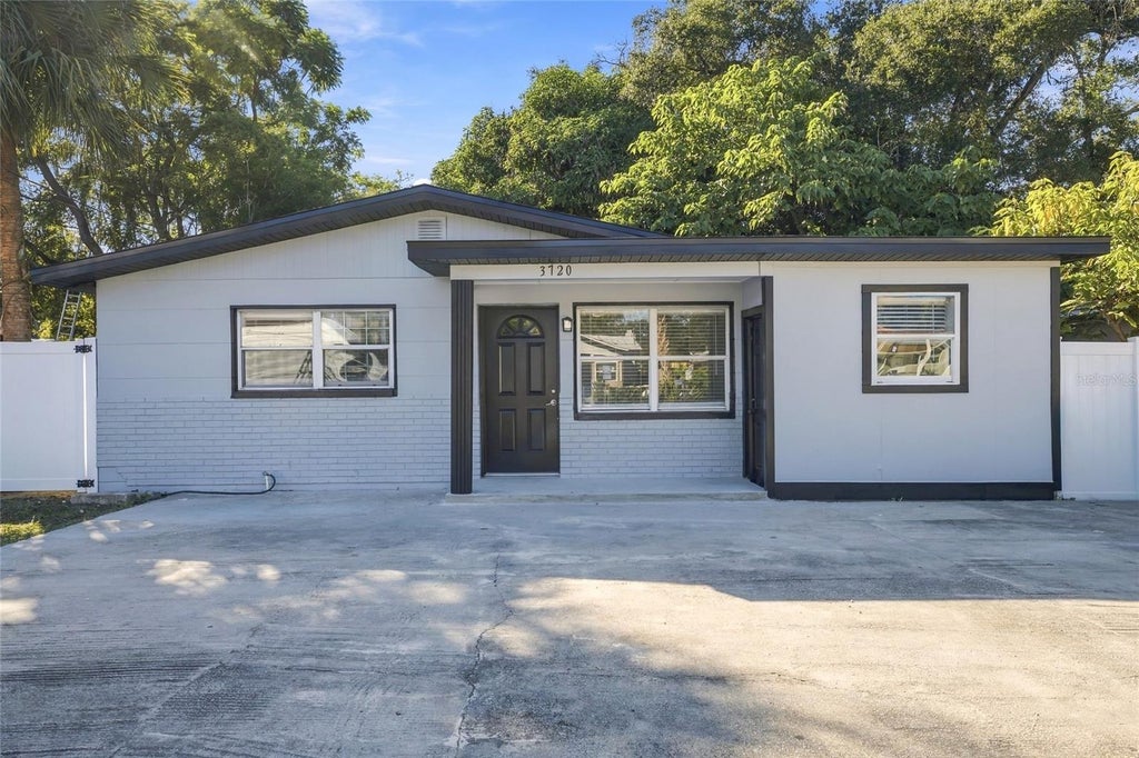 Photo of 3720 N Garrison Street, Tampa, FL 33619 (MLS # TB8561838)