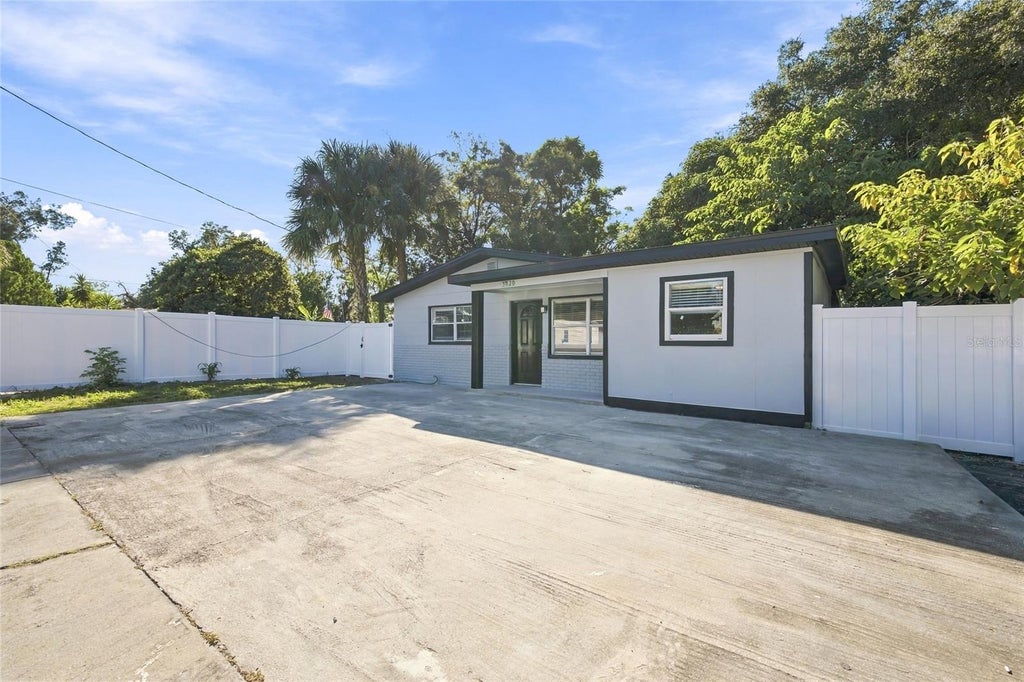 Photo of 3720 N Garrison Street, Tampa, FL 33619 (MLS # TB8561838)