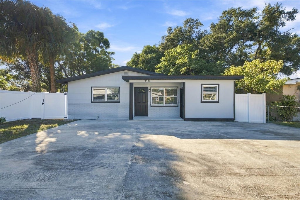 Photo of 3720 N Garrison Street, Tampa, FL 33619 (MLS # TB8561838)
