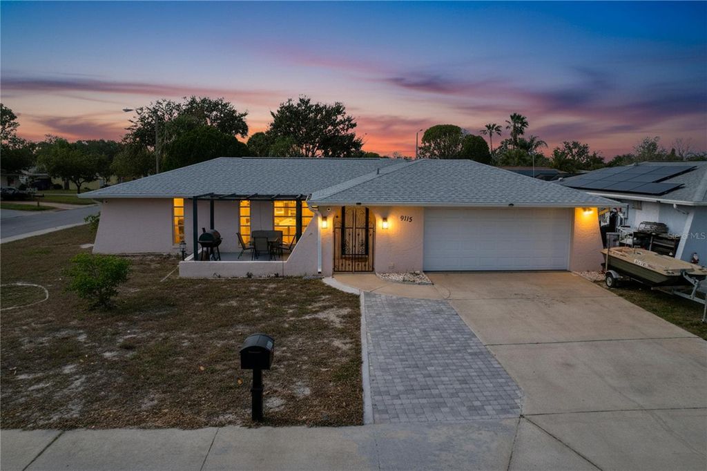 Photo of 9115 Panda Lane, Port Richey, FL 34668 (MLS # TB8453894)