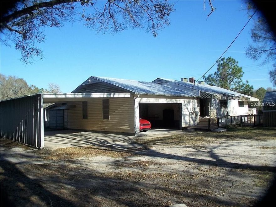 Renovations to be completed soon!

Bring Everything! Almost 2 acre property with 2 bedroom + den 1.5 Bathroom home. 2 car garage plus covered parking pad for 4 extra vehicles, paddock & outside deck / patio / bar / Small area to park your own hot tub. The homesite is huge and in the Country but still only minutes from Bruce B Downs, New Tampa area.