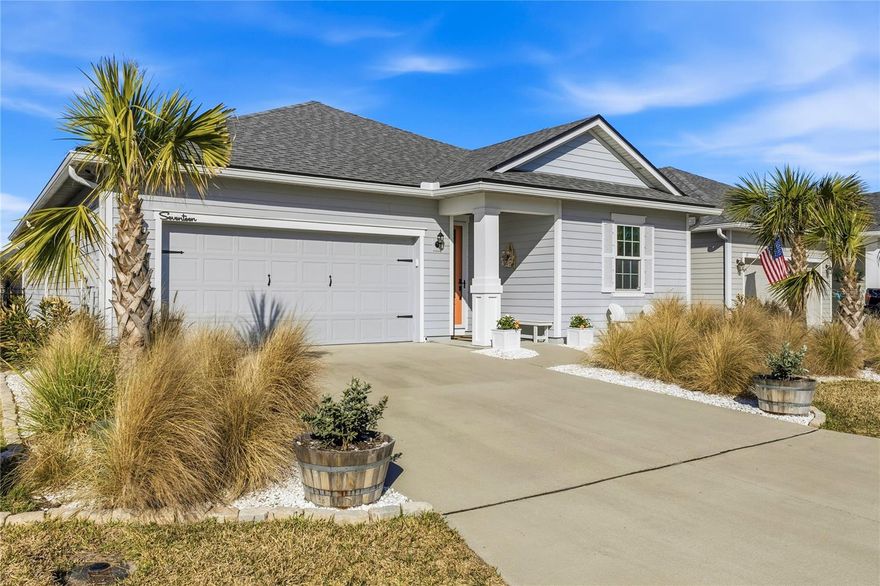 Luxury meets functionality in the Matanzas Shores Community. This spacious, open plan home with 3 bedrooms, 2 bathrooms is designed for modern living and gracious entertaining. The kitchen features stainless steel appliances, quartz countertops and a roomy pantry. The large primary suite boasts an upgraded bathroom with a custom walk-in closet.  The oversized garage (607sf) even has a space for your golf cart.  Step outside to the amazing covered porch, a perfect spot to relax and view wild life on the tranquil pond. There are amenities galore:  Enjoy access to a boat house with kayak storage and a fishing dock with gazebo on the intra-coastal waterway.  Additional amenities include pickleball, tennis, volleyball, shuffleboard, beach access, and scenic walking trails.  Less than a 30 minute drive to the historic City of Saint Augustine, with all the shopping and restaurants of Palm Coast and Flagler Beach within a short drive.  This is the perfect place to call home!