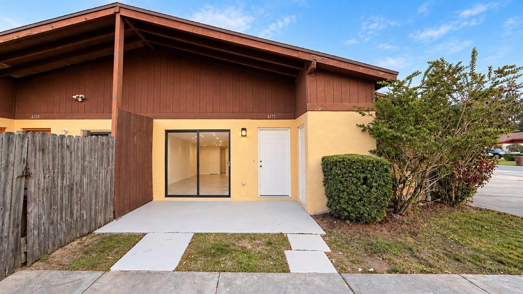 Photo of 4171 Flying Fortress Avenue, Kissimmee, FL 34741 (MLS # S5160260)