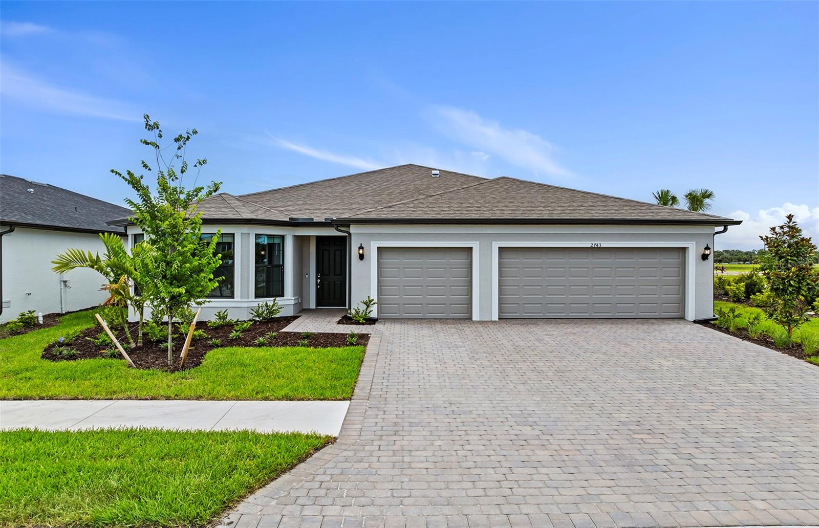 Available Now at The Strand at Cedar Grove. This beautiful Astoria floorplan is a brand-new 3-bedroom, 2 1/2-bathroom single-family home featuring a den and 3 car garage. Designed for both everyday living and elegant entertaining, this home offers an open layout with a pocket sliding glass door that extends the living space to the outdoors. The kitchen is equipped with white cabinetry, quartz countertops, and stainless-steel appliances, impact glass windows, smart home package and more. The Strand at Cedar Grove, located in North Port, offers new constructed homes designed to fit your lifestyle and budget. Families looking for exceptional schools, open concept living, and community amenities like a neighborhood pool, pool cabana, and tot lot play area will find The Strand is the perfect place to call home.