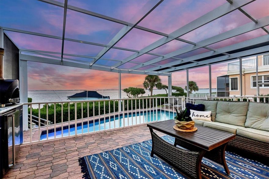 Experience the epitome of luxurious coastal living in this stunning, fully renovated waterfront villa, nestled in the exclusive Bay Isles’ coveted Corey's Landing neighborhood. This waterfront gem offers the most breathtaking unobstructed views of the Sarasota Bay and skyline. Designed with a nautical lifestyle in mind, this home features a brand new 55’ dock and boat lift that can accommodate a 35’ vessel, as well as private kayak launch. Imagine the thrill of setting sail at sunrise or embarking on serene sunset cruises, all from the comfort of your own backyard. 

Step inside this meticulously renovated sanctuary, where every detail has been carefully curated to exceed your expectations. The open floor plan seamlessly blends sophistication with comfort, creating a space that is both inviting and awe-inspiring. With its impressive 23’ ceilings in the main living area and spacious white kitchen adorned with new Thermador appliances, an oversized kitchen island, and charming farmhouse sink, this hidden gem is a true testament to elegance. The Great Room boasts a shiplap decorative wall, while the dining room offers views of an atrium with a water feature and lighting. You'll also find a drybar with a built-in icemaker, wine cooler, and beverage cooler, perfect for entertaining. With a brand new roof in place, you can bid farewell to worries about maintenance, allowing you to fully embrace the joys of waterfront living. 

The addition of a new pool cage with picture frame screens ensures unobstructed views of the Sarasota Bay, creating an atmosphere of pure serenity. Enjoy the luxury of a heated pool and spa with new pool equipment, inviting you to dive into relaxation no matter the season. And for those who appreciate outdoor living, the outdoor kitchen including grill, beverage cooler, outdoor sink, and Alpha pizza oven allows you to master the art of al fresco dining and entertaining.

With four inviting guest bedrooms and four full renovated bathrooms, everyone will enjoy a comfortable and private retreat. Upstairs, discover a versatile loft space that provides even more room for relaxation or can be easily converted to accommodate additional guests. This loft space not only expands the possibilities for hosting family and friends but also offers the potential for a home office, game room, or cozy reading nook, ensuring there's a place for everyone to unwind and make cherished memories in this waterfront paradise. You'll also find a main floor office with French doors, allowing you to work in style with stunning views of the water.

As if that weren't enough, Corey’s Landing offers resort style pool, tennis courts and exclusive access to the private Bay Isles Beach Club, complete with showers, restrooms, private storage, grills, and a beach volleyball net. Don't miss the chance to make this slice of Sarasota Bay paradise your very own. Contact us today to schedule your private tour and experience the essence of waterfront luxury living in Corey's Landing. Your dream home awaits!
