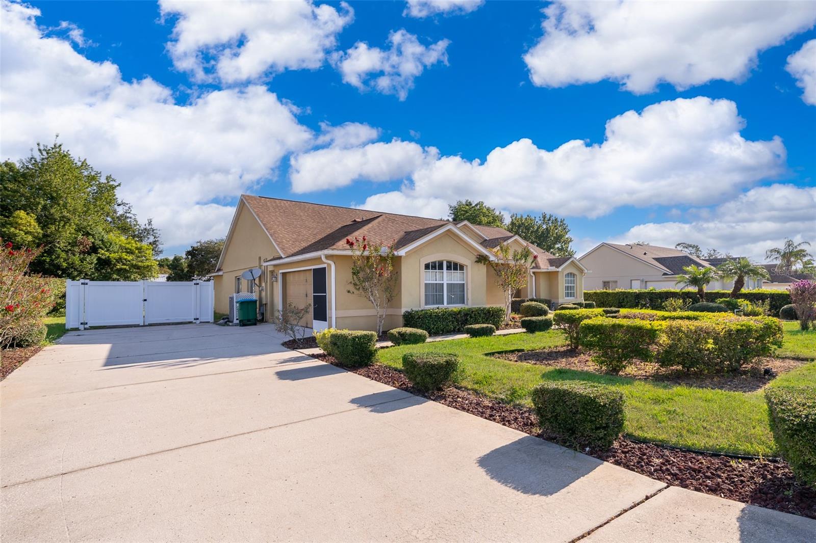 Welcome Home to Tranquil Living in Oak Ridge Estates! This beautifully maintained estate home is ideally located just minutes from major highways, top-rated schools, shopping centers, and medical facilities — offering the perfect balance of convenience and serenity.
Step inside to discover elegant architectural touches including decorative niches, plant shelves, and custom ceramic tile flooring throughout the main living areas.
The spacious interior laundry room provides added storage and functionality, while the gourmet kitchen is a chef’s dream — featuring rich wood cabinetry, expansive counter space, built-in microwave, convenient desk nook, breakfast bar, and a cozy breakfast area that flows seamlessly into the oversized family room with custom tile work.
The thoughtfully designed split floor plan places the luxurious master suite in its own private wing, complete with a spa-like bath offering a walk-in closet, soaking garden tub, dual vanities, glass-enclosed shower, and a separate water closet. Secondary bedrooms are positioned for comfort and privacy, including a versatile fourth bedroom ideal for a home office or guest suite.
Enjoy year-round outdoor living on the large, screen-enclosed patio under truss — perfect for entertaining or quiet evenings. A detached utility shed provides extra storage for tools, toys, or hobbies.
Schedule your private tour today!