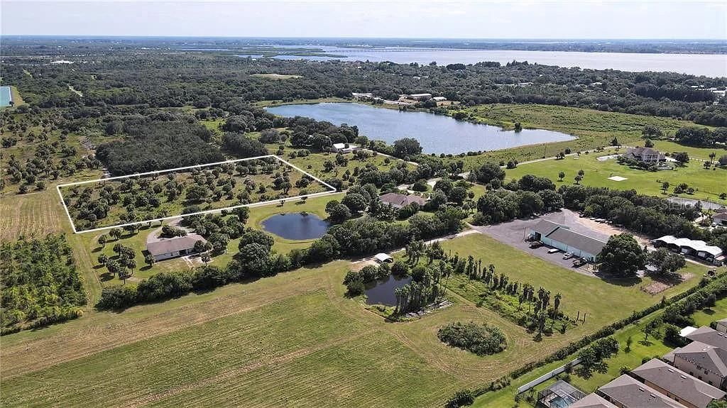 Photo of Rowland Dr, Port Charlotte, FL 33980 (MLS # C7522409)