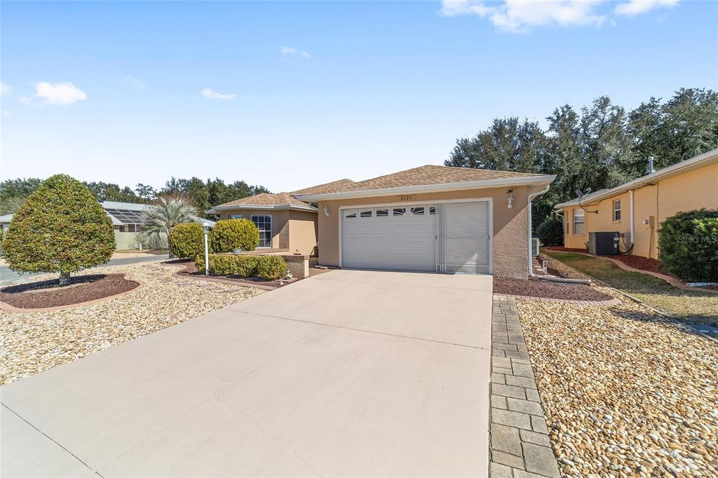 Photo of 8125 SW 81st Loop, Ocala, FL 34476 (MLS # OM718423)