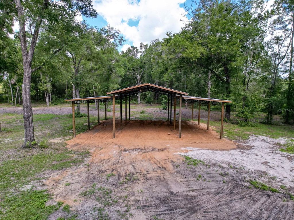 Photo of 10097 Weatherly Road, Brooksville, FL 34601 (MLS # W7876741)