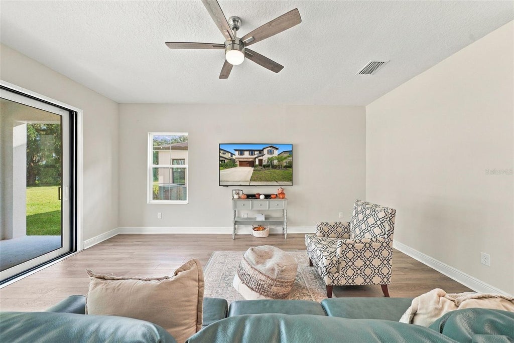 Photo of 14733 Gallop Run Drive, Lithia, FL 33547 (MLS # TB8558338)