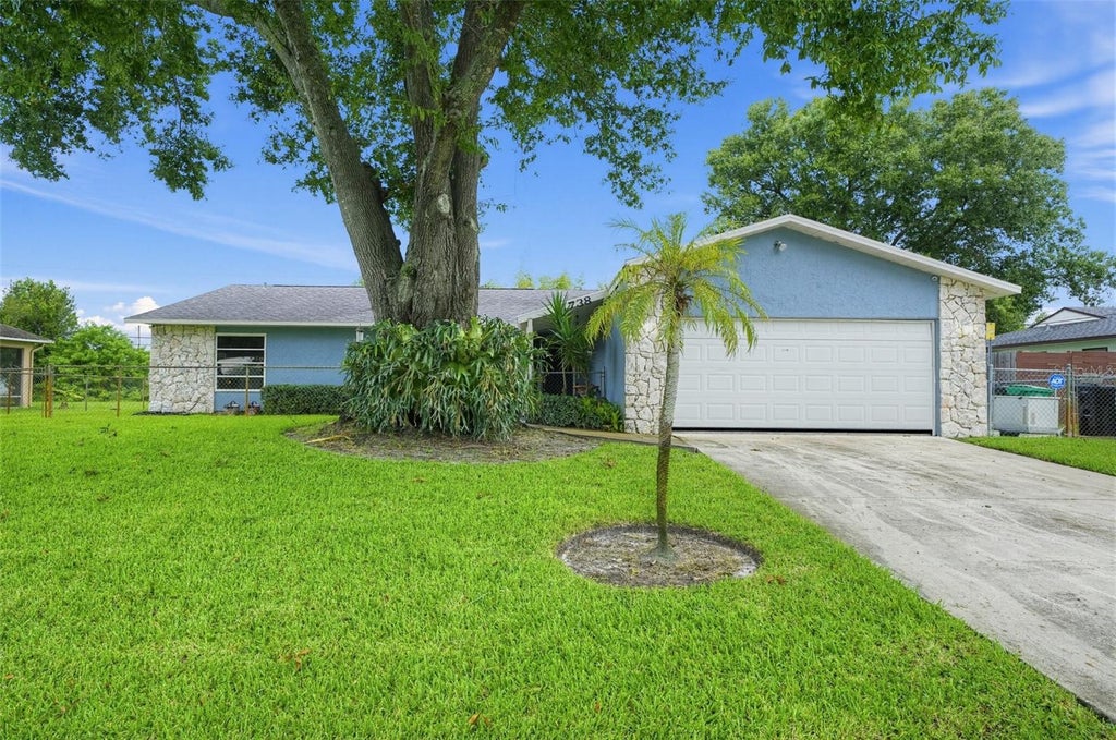 Photo of 1738 SW Beeker Street, Port Saint Lucie, FL 34953 (MLS # TB8547828)