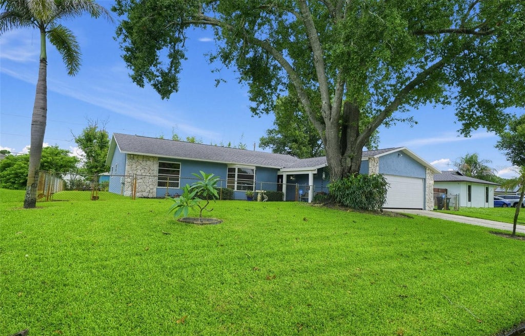 Photo of 1738 SW Beeker Street, Port Saint Lucie, FL 34953 (MLS # TB8547828)