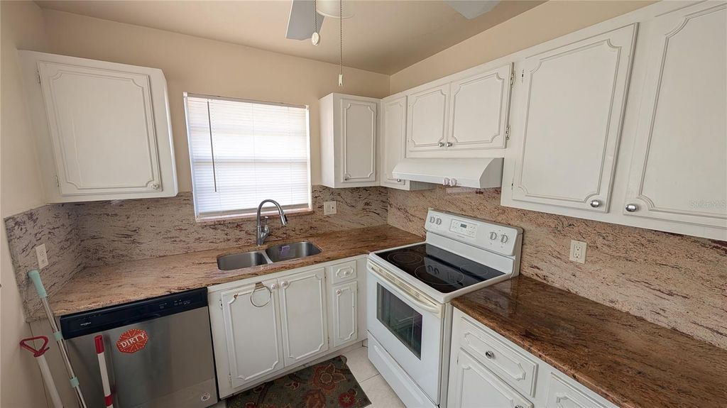 Photo of 438 Bluebird Lane, Delray Beach, FL 33445 (MLS # TB8463084)