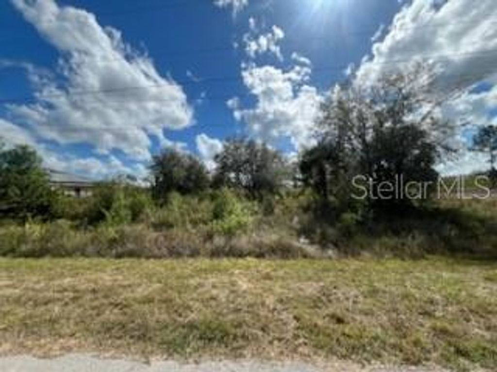 Photo of 1928 Vesper Court, Lehigh Acres, FL 33972 (MLS # OK224932)