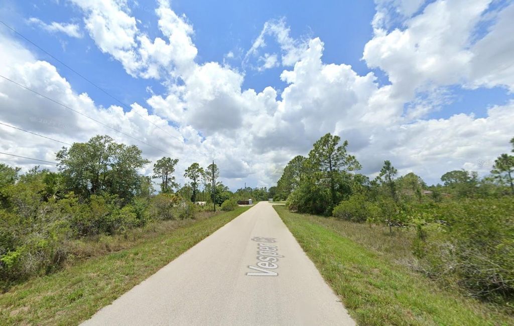 Photo of 1928 Vesper Court, Lehigh Acres, FL 33972 (MLS # OK224932)