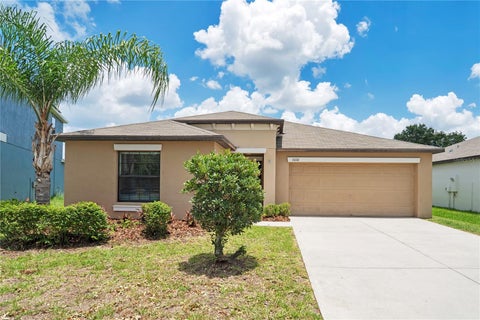 Photo of 10116 Carloway Hills Drive, Wimauma, FL 33598 (MLS # O6417590)