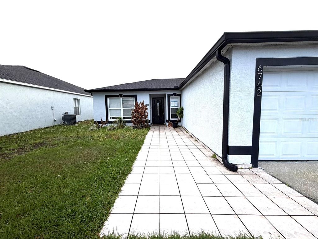 Photo of 6762 Pomeroy Circle, Orlando, FL 32810 (MLS # S5147128)