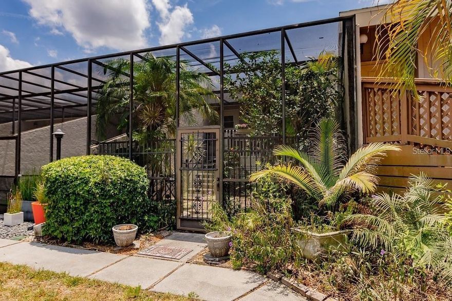 ***5% financing for qualified buyers for two years. Seller will buy down your mtg. rate for two years to only 5% - FURNISHED*** Tucked behind Bobby Jones Golf Course, "The Hideaway" is one of Sarasota’s best-kept secrets. This uniquely designed condo offers a peaceful retreat with vaulted ceilings, stunning golf course views, and a private, screened courtyard. The outdoor space features lush plantings, stepping stones, and an upper wood deck, creating a serene environment perfect for relaxation or a play area for pets.

Inside, the condo is turn-key furnished and thoughtfully designed for both comfort and style. Wood and slate floors add warmth and character, while the living space is enhanced by a built-in electric fireplace and custom wall unit. Natural light pours in through 12 feet of sliding glass doors, opening to the upper deck—the ideal spot for unwinding at sunset.

The kitchen is fully equipped with newer appliances, including a stainless steel refrigerator and dishwasher, along with cookware, dishes, and glassware. A walk-in closet offers ample storage, and the in-unit washer and dryer add convenience. The bedroom is furnished with a queen-size bed dressed in luxurious 850+ thread count sheets, while two HD TVs with 120 channels and high-speed Comcast Wi-Fi provide entertainment and connectivity.

The condo's surroundings are just as inviting, with a screened-in foyer and garden area, a wood deck with wicker furnishings, and a charcoal grill for outdoor cooking. A large open green space just beyond the door leads to moss-covered ancient oaks and a small creek, while the newly reopened Bobby Jones Golf Course provides a beautiful, expansive backdrop. A swimming pool is just steps away, offering a refreshing escape.

With assigned parking and a convenient location near shopping and dining, this condo is also within walking distance to the bus stop for easy access to downtown Sarasota. Even better, all special assessments have been paid in full by the seller! Whether you are looking for that perfect, affordable vacation home, an investor in search of an income property, or a first-time homebuyer looking for a comfortable property that can later be used as a rental, "The Hideaway" offers privacy, comfort, and the best of Sarasota living.