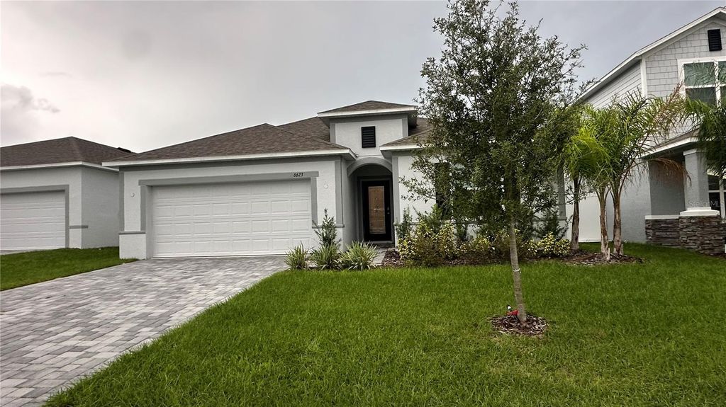 Photo of 6623 Lullaby Way, Mascotte, FL 34753 (MLS # TB8439255)