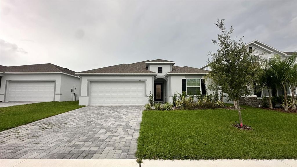 Photo of 6623 Lullaby Way, Mascotte, FL 34753 (MLS # TB8439255)