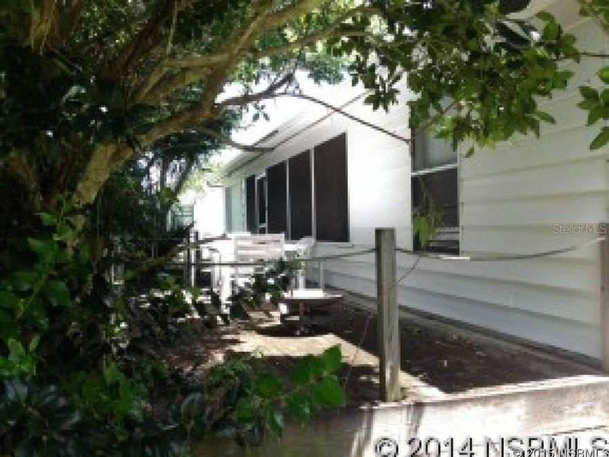 Cathedral ceilings and large open floor plan. Screened in front porch, Kitchen has a breakfast bar, laundry room and a 1 car garage. Close Proximity to Sports Complex and parks.