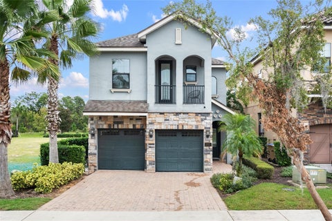 Photo of 945 Desert Mountain Court, Reunion, FL 34747 (MLS # O6412283)