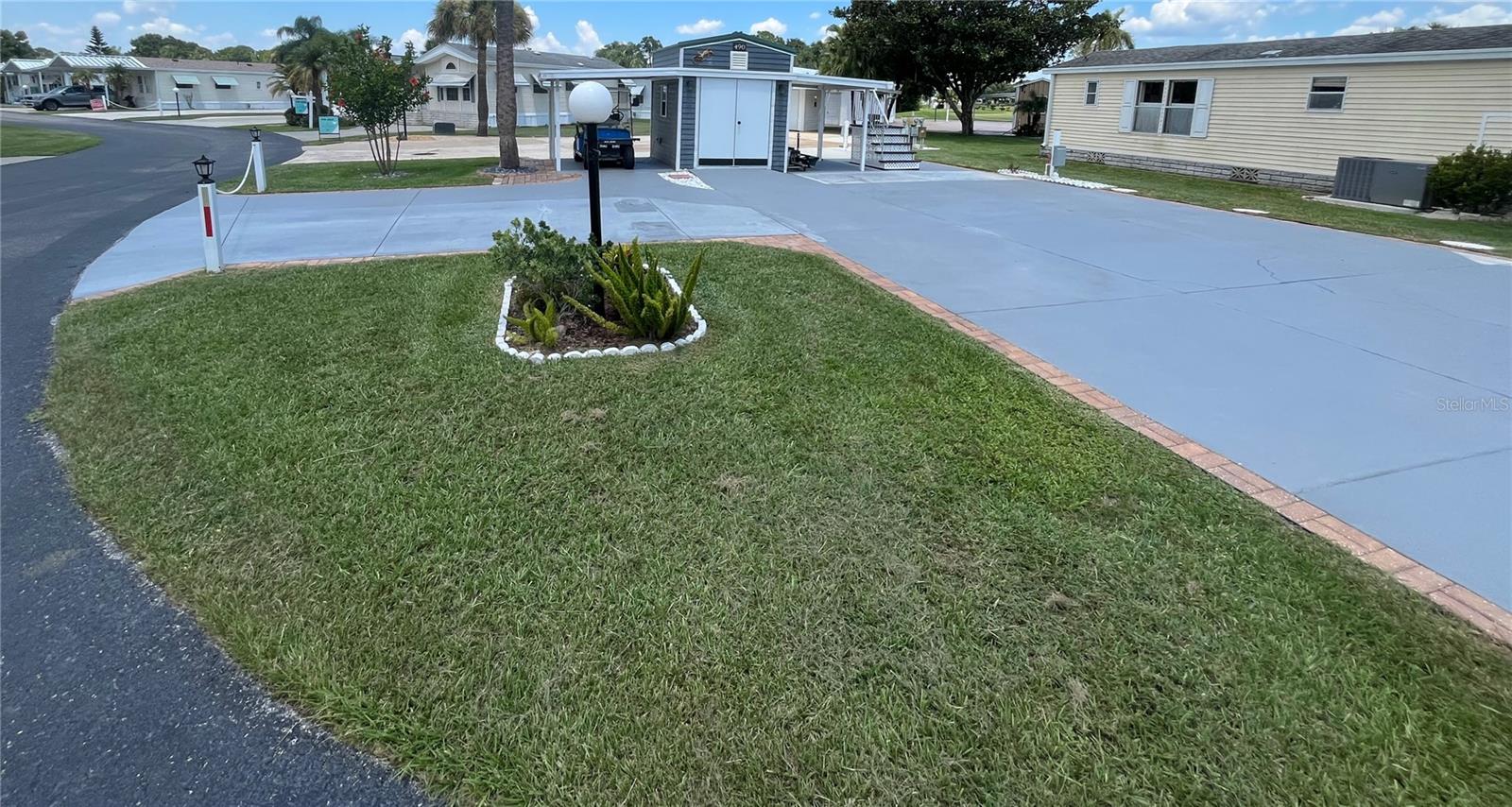 Spacious Corner Lot with RV Parking & Outdoor Amenities!
Don’t miss this oversized corner lot offering plenty of room for large RVs, extra parking, outdoor gatherings, or simply relaxing in your own retreat. Conveniently located just a short distance from the community clubhouse, pool, golf course, and pro shop, you’ll have easy access to everything you need for an active lifestyle.
Included with the sale:
Golf cart (new batteries, refurbished seats, and new charger)
Gas grill
Washer & dryer (only 3 years old)
Chest freezer & refrigerator
New laundry sink
Storage shed (refurbished in the last year)
Outdoor kitchen – perfect for entertaining!
Upgrades:
Electrical and plumbing updated in Spring
Shed was updated and refurbished last year
Whether you’re looking for a seasonal getaway or full-time Florida living, this property is ready for you to move in and enjoy!