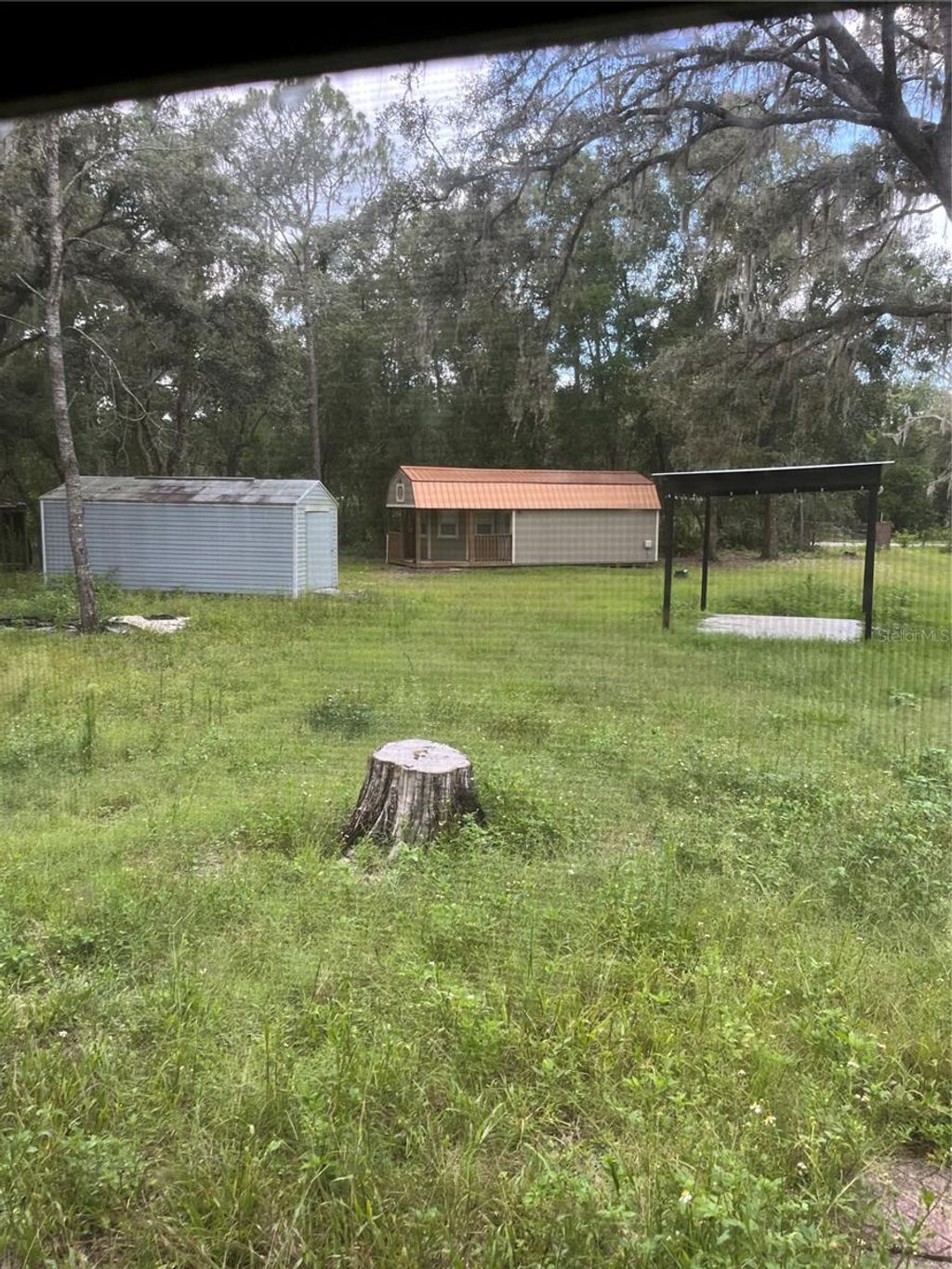 Photo of 5419 Cyril Drive, Dade City, FL 33523 (MLS # TB8413165)