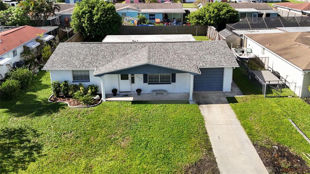 Photo of 3426 Pinon Dr, Holiday, FL 34691 (MLS # TB8417532)