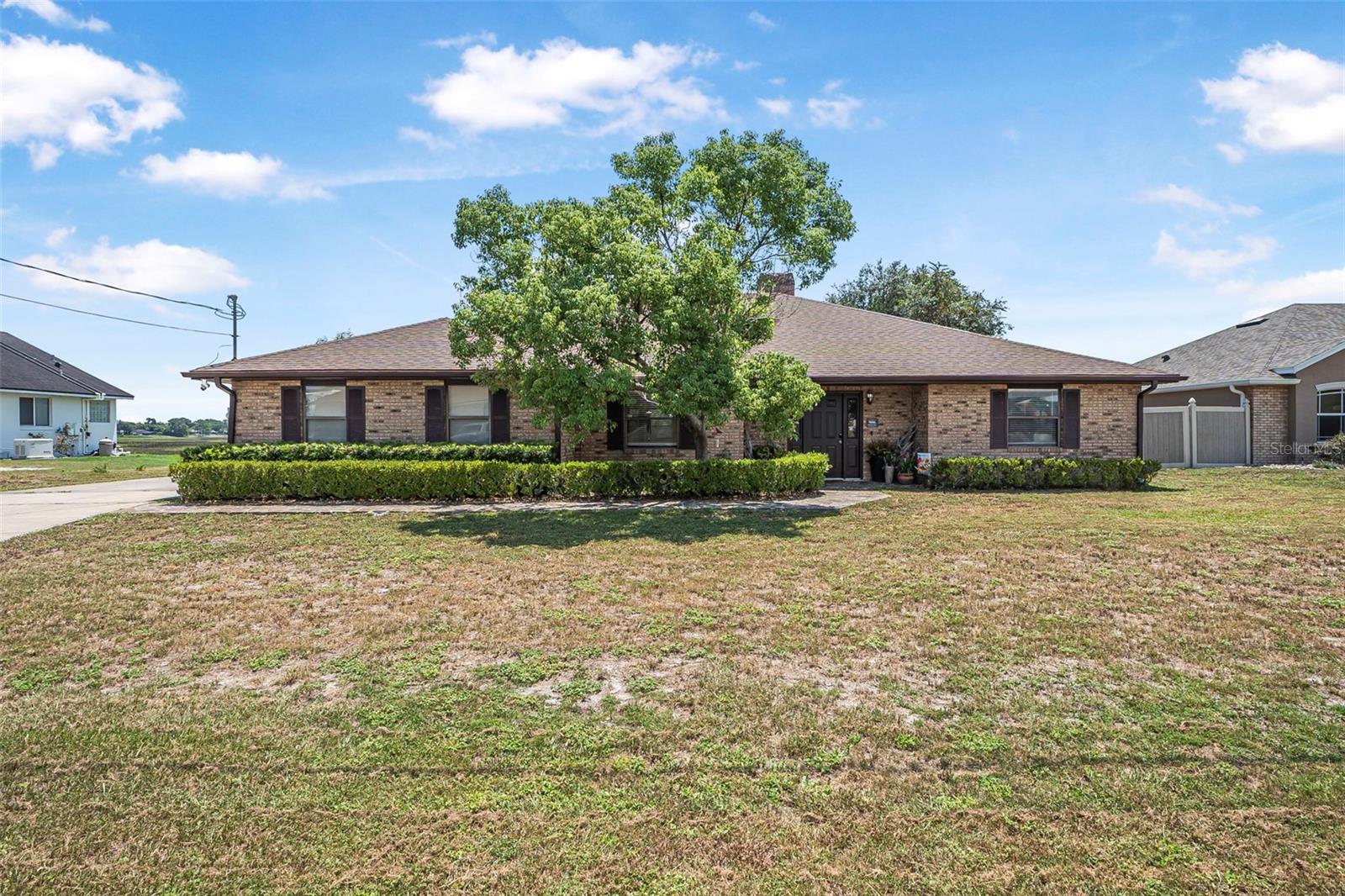 A gourmet cook's dream with waterfront to boot! Excellent water views of Louise Lake from this solid brick home. Recent kitchen remodel loaded with solid wood cabinets, double pantry, new appliances, 42" upper cabinets & high tech sink with multiple features. Many updates including 2023 roof, newer HVAC systems, Solar Electric System, & Shed. This 3/2 plan includes a bonus room which would make a nice office, craft room, or play area. You will love the peaceful wide views of the lake. A small dock has been added. Bring you kayaks, canoe or motorcraft for outstanding bass fishing, or sunset cruises. Large 3 car garage side entry plus ample driveway area for parking. No homeowners association and low power bills.