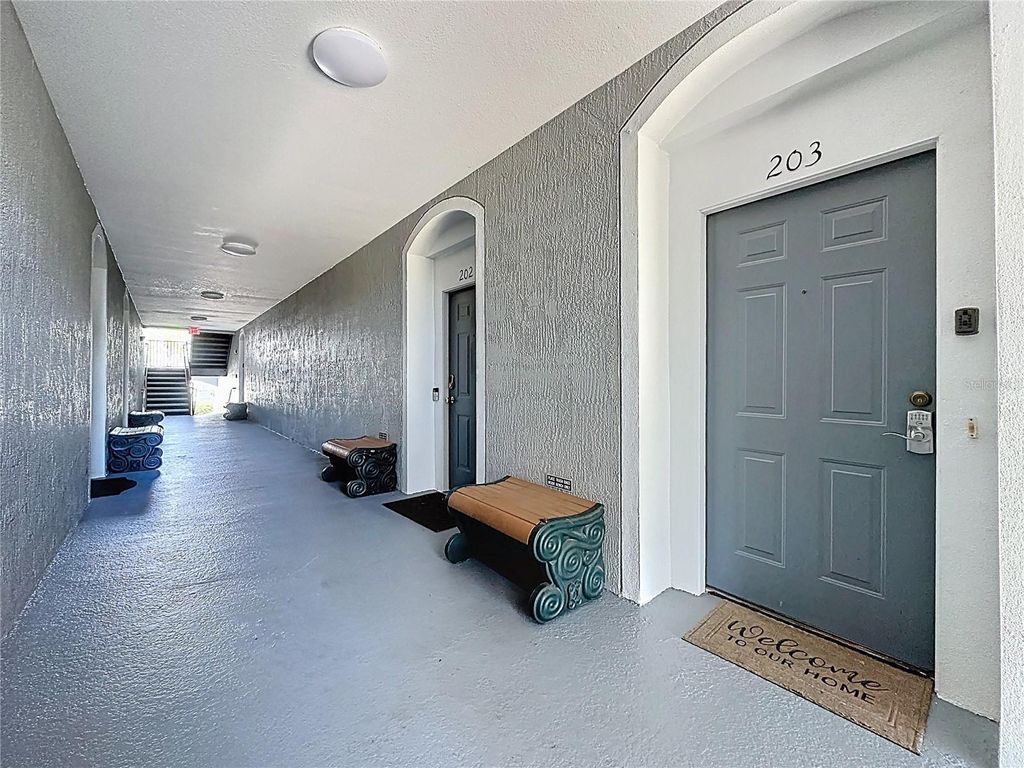 Photo of 2300 Butterfly Palm Way #203, Kissimmee, FL 34747 (MLS # TB8501444)